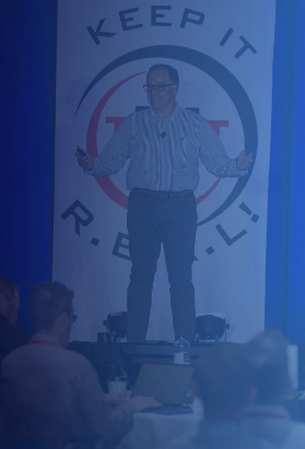 CIO Landing speaker presenting on stage at a business and IT leadership event