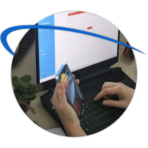 lady on the desktop in the office near a laptop and computer