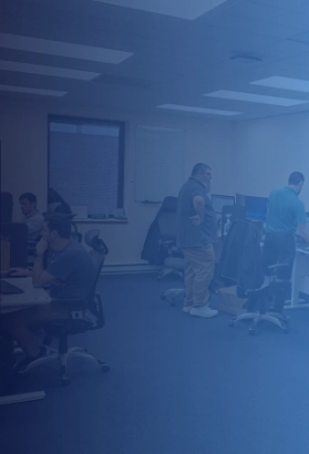 technical team actively monitoring and managing IT systems in the operations center